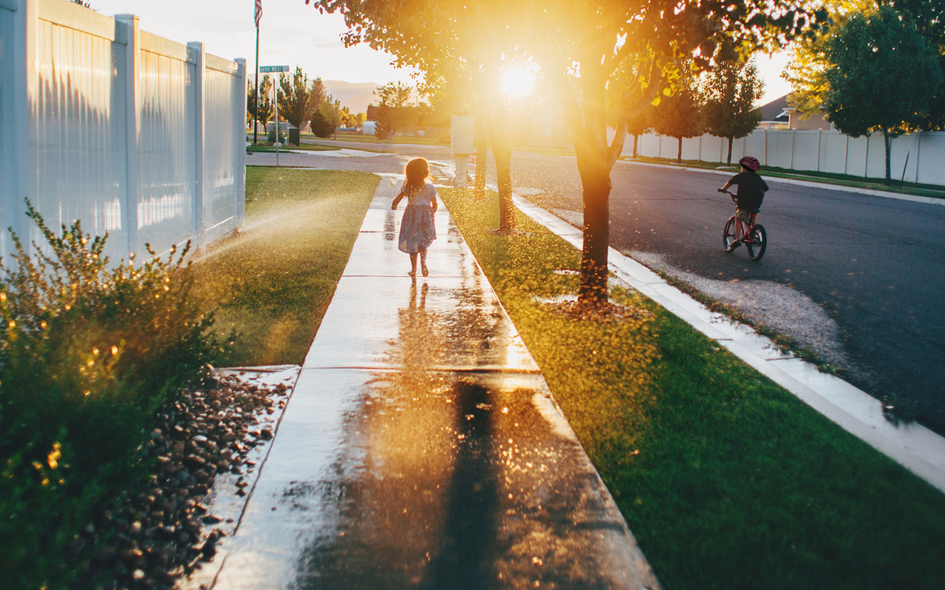 Girl running on sidewalk