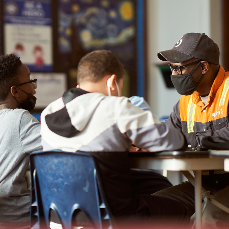 Spire employees volunteering at school