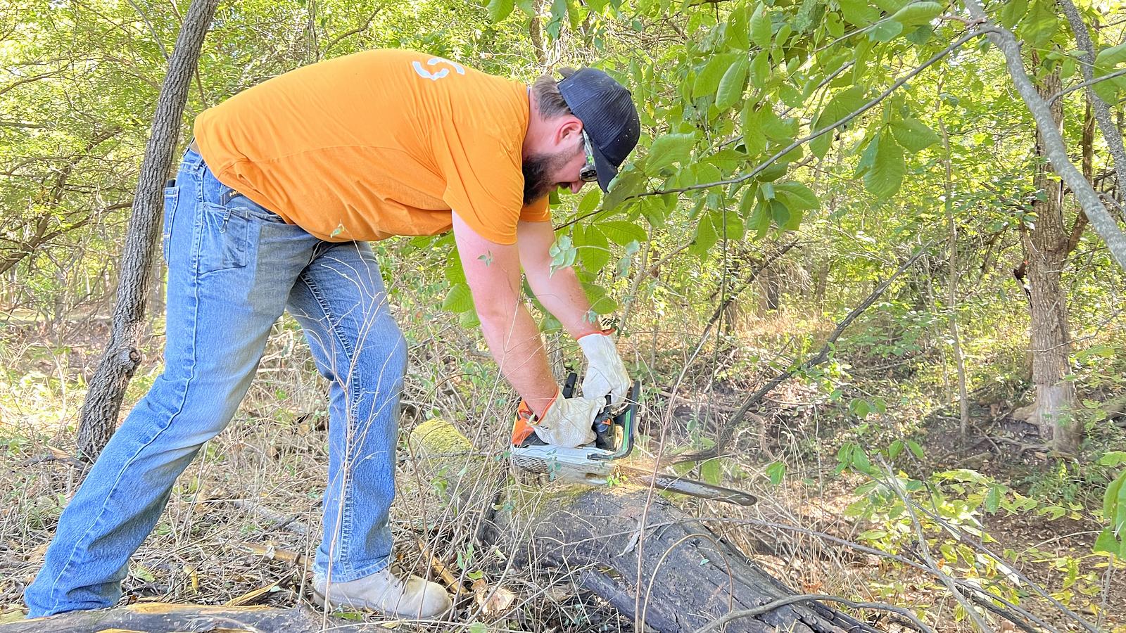 man working with chainsaw
