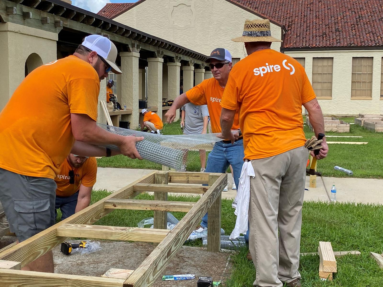 Employees planting beds