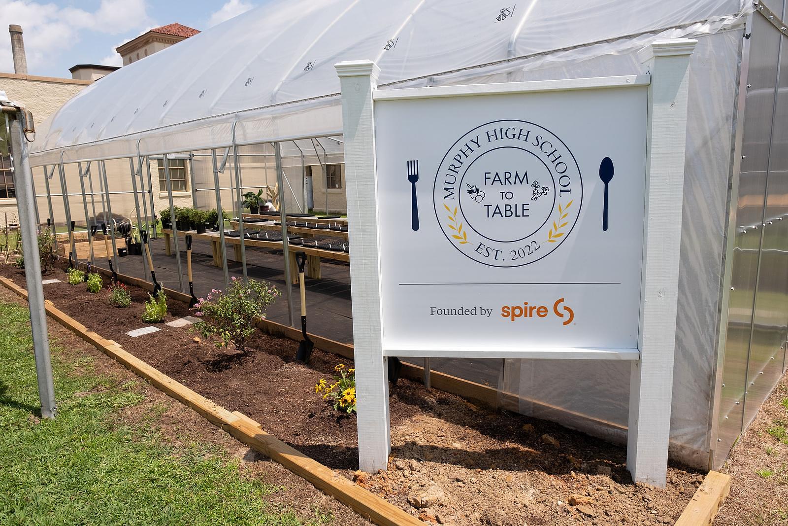 greenhouse with sign