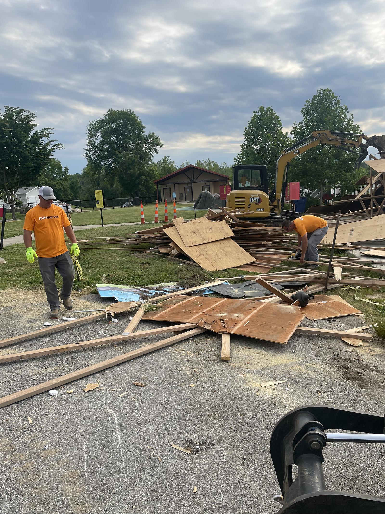 spire employees putting a pavilion back together 