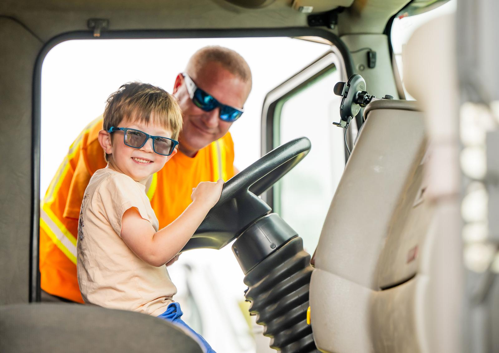 Image of Spire employee and his son in a truck