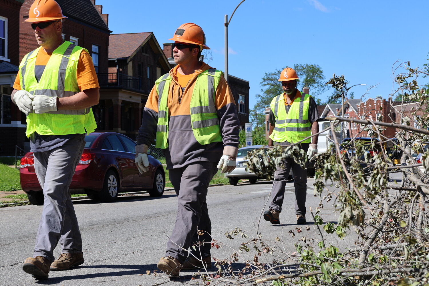 Image of Spire crews walking in the debris