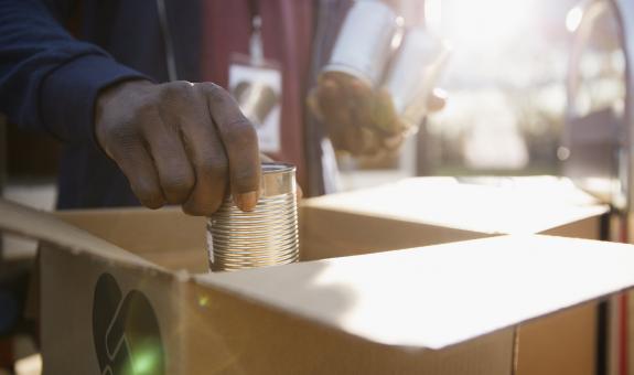 Man volunteering at food bank