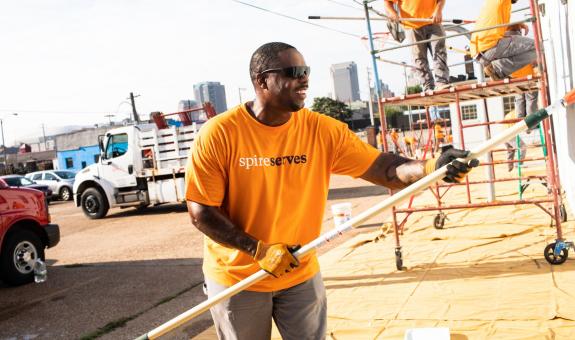 Spire employee serving the community