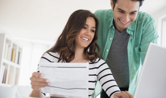 Couple reviewing rebates