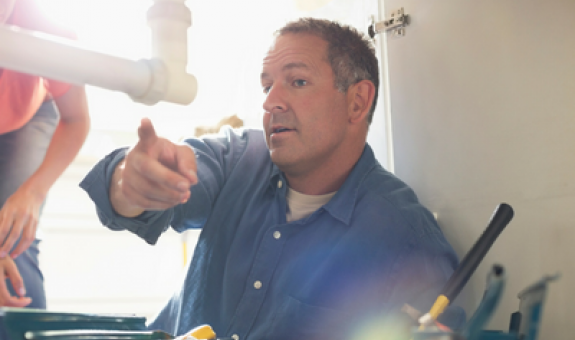 Contractor explaining repairs