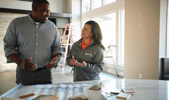 Contractor and homeowner talking