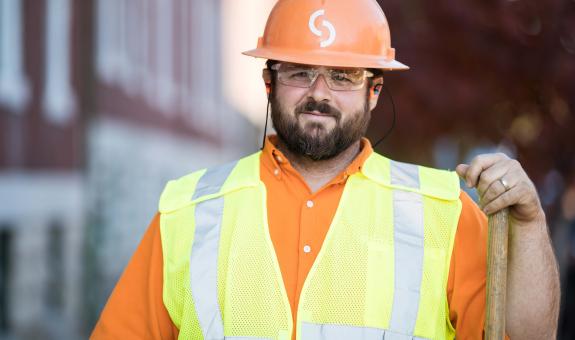 Spire employee wearing hard hat