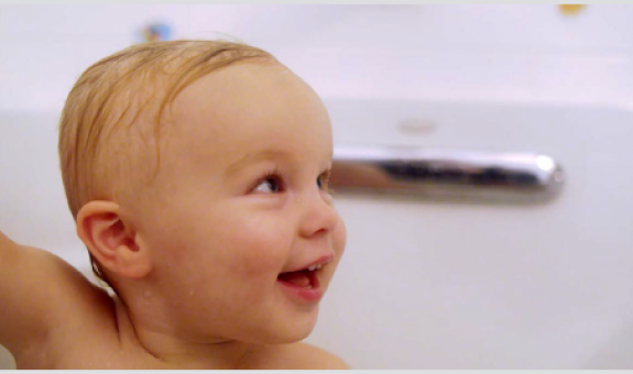 Baby taking a bath