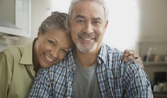 Middle aged couple smiling together