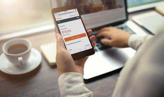 Image of customer using Spire website on mobile phone
