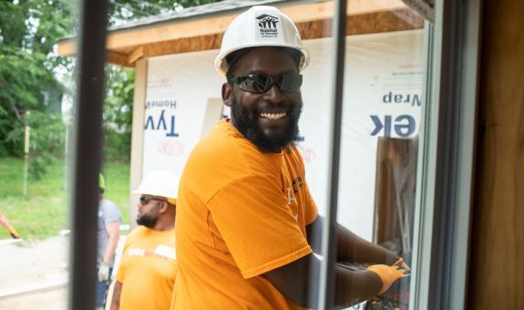 Image of Spire employee volunteering at construction site