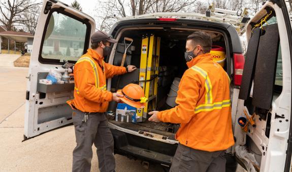 Image of Spire employees working with masks