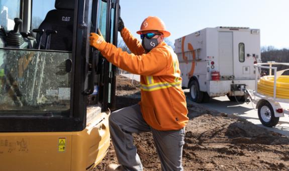Field worker in mask