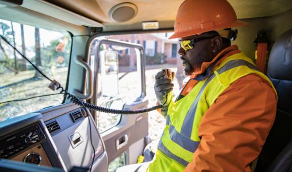 Field worker in truck