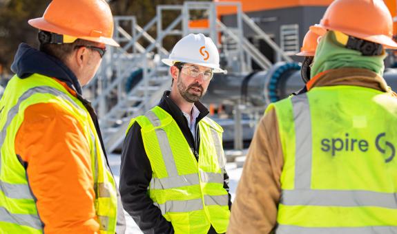 Image of Spire employees in the field
