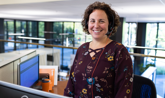 Spire Employee in Customer Service Office