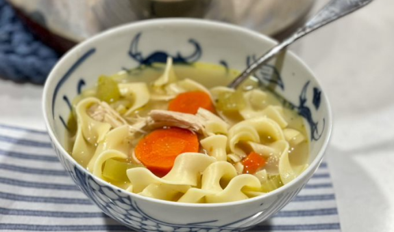 Image of a bowl filled with turkey soup