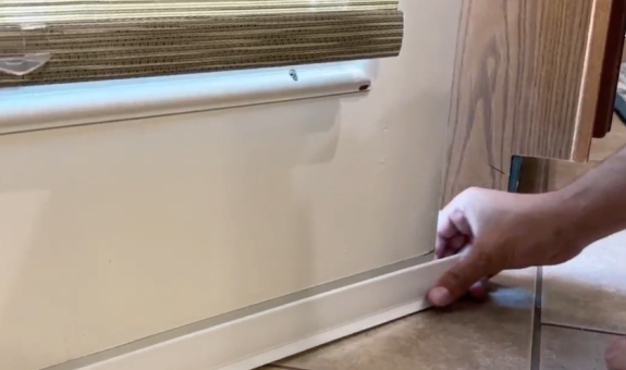 Adding a bottom seal to a door