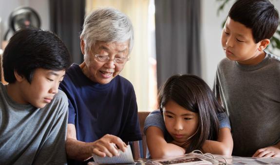 Image of a family reading together