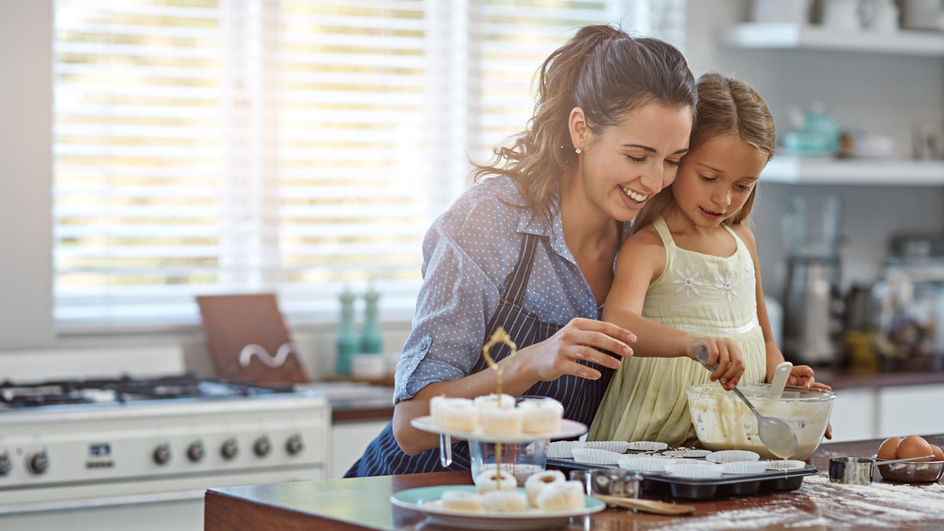 Mom and daughter baking
