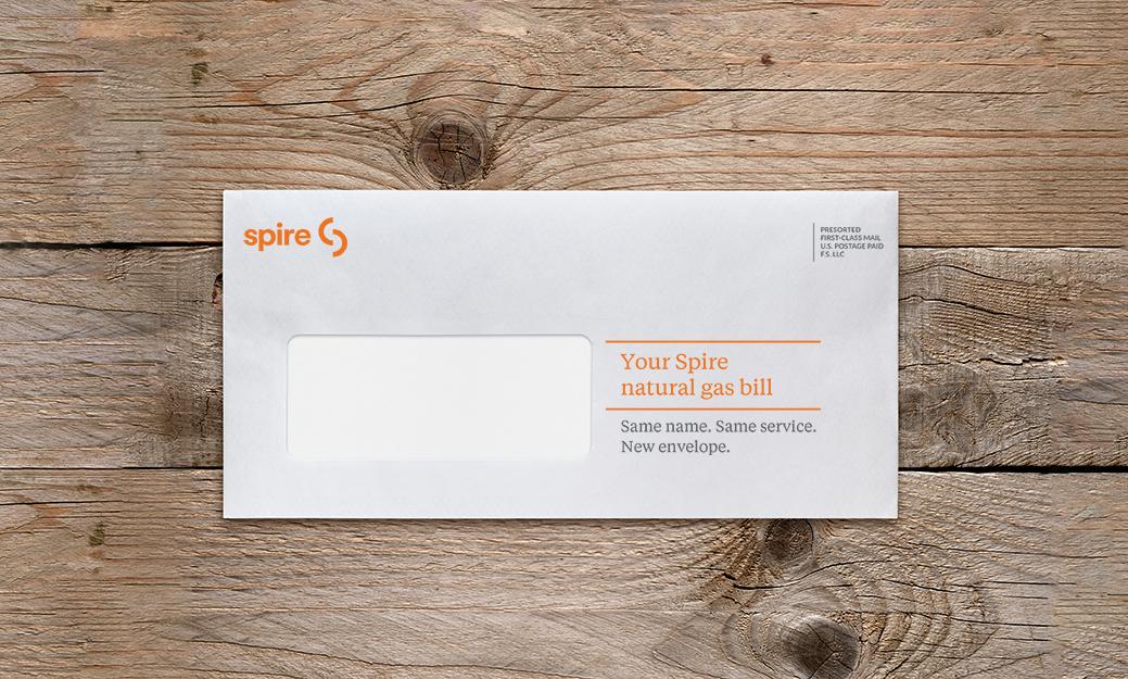 Image of white envelope on a wood table