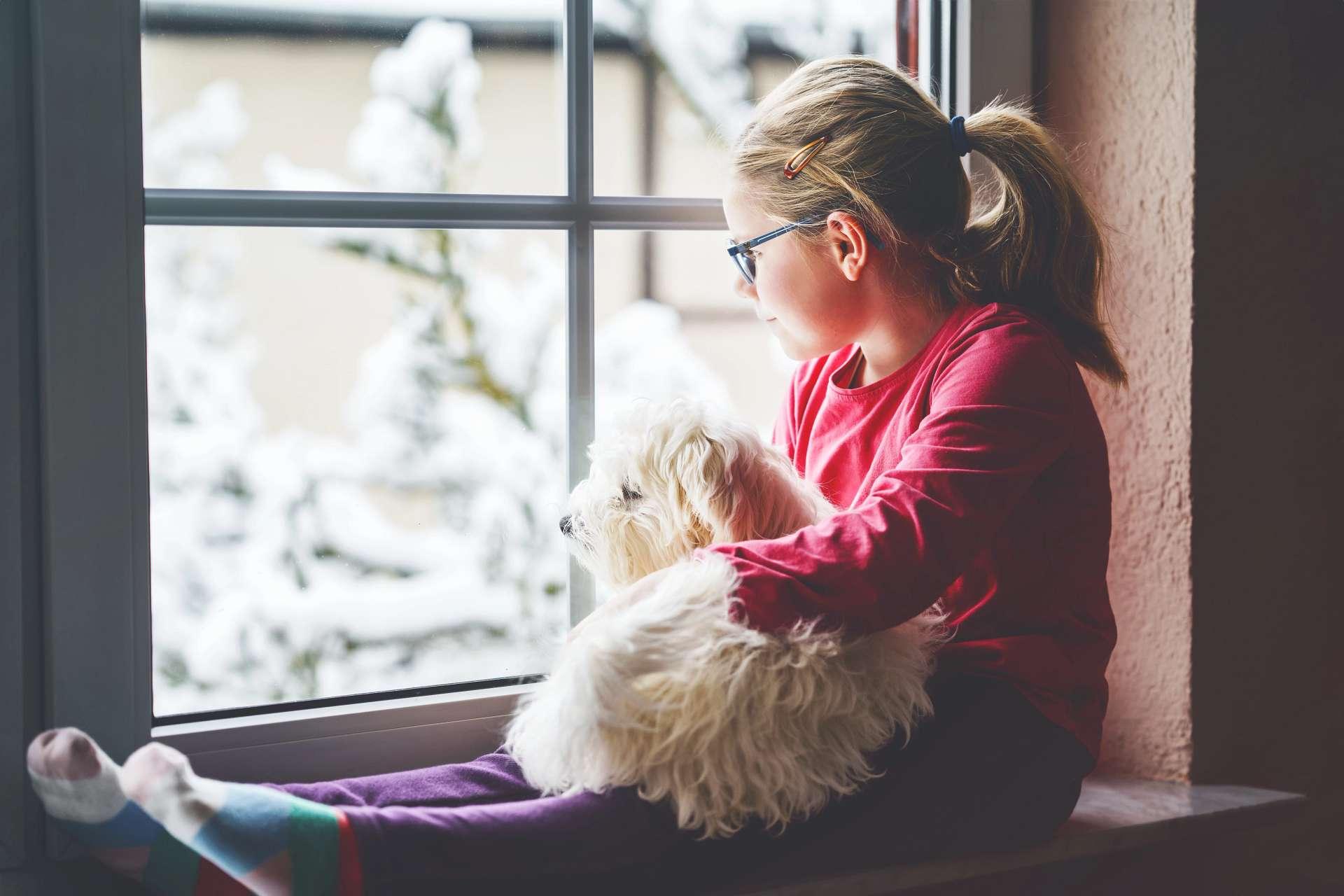 Image of little girl by the window