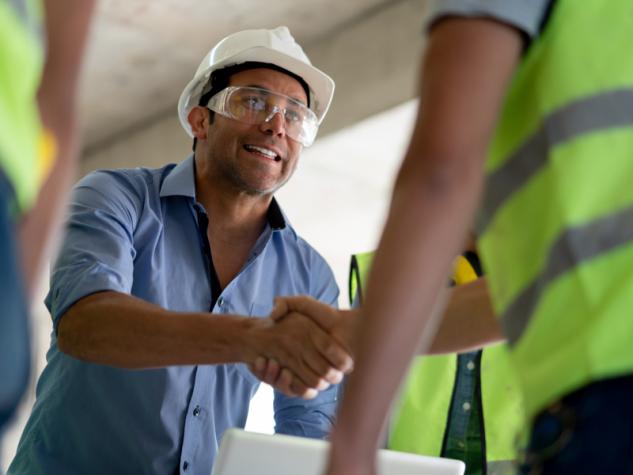 Image of contractor shaking someone's hand